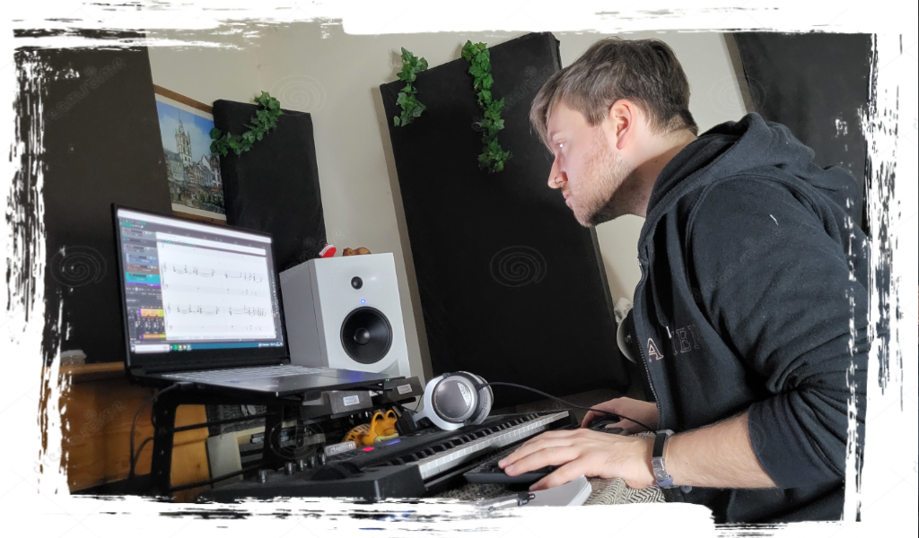Musician composing on a computer